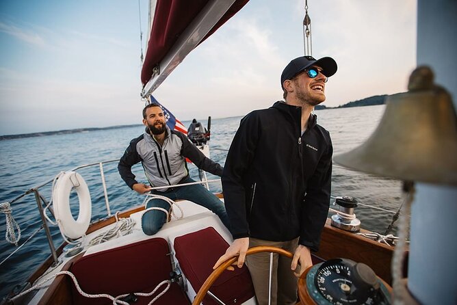 Sail Bainbridge Island & Seattle Waters - Luxury Classic Sailboat - Stop 2: Seattle skyline from the water, with volcanos and open-water views