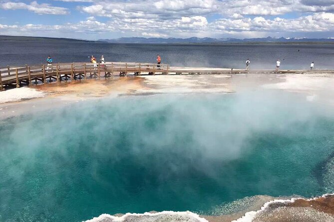 Yellowstone Grand Teton and Coeur d’Alene 5-Day Tour from Seattle - Day 2: Yellowstone’s Icon Line-Up with Old Faithful and Grand Prismatic